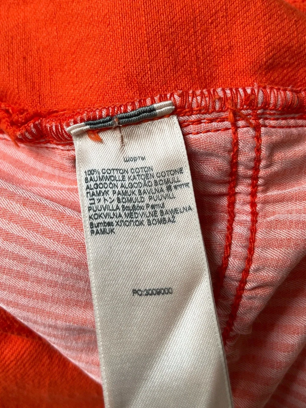 Women’s 7 for all Mankind Easy Ruby Orange raw hem button fly Jean short.Size 26